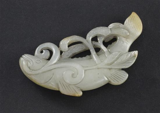 A Chinese pale celadon and russet jade carving of a fish, 19th century, 6.5cm